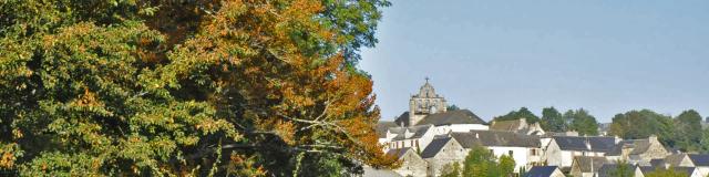 Village, its church with a combed bell tower.