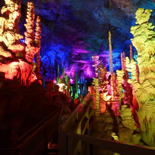 Aven Armand cave on the Causse Méjean. Illuminated stalagmites.